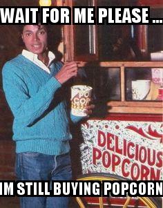 Michael Jackson Buying Popcorn with the caption WAIT for me please ... IM STILL BUYING POPCORN